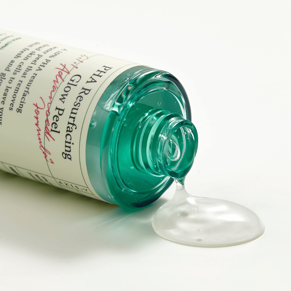 En flaske AXIS - Y PHA Resurfacing Glow Peel 50ml på en glatt overflate.
