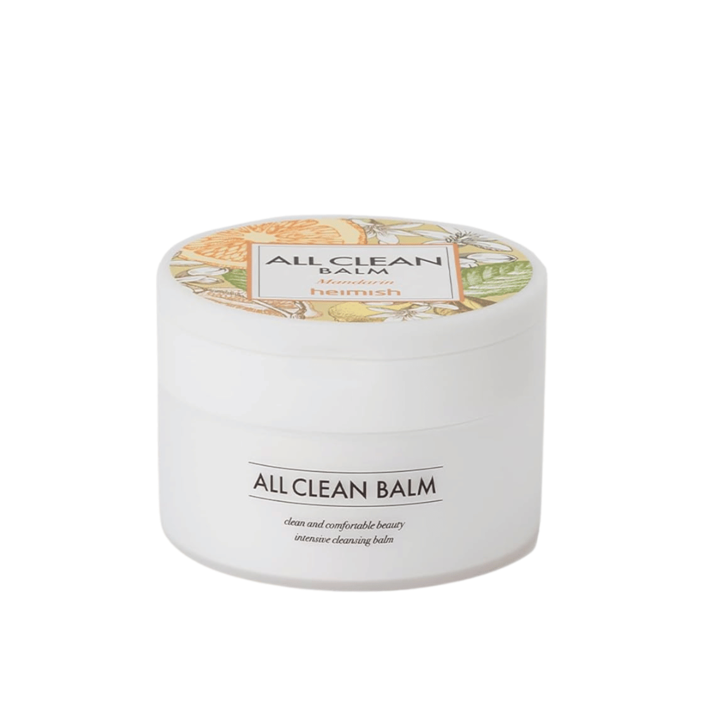 En krukke av Heimish All Clean Balm med mandarin-duft, en intensiv rengjøringsbalm, med en fargerik etikett og hvit emballasje.