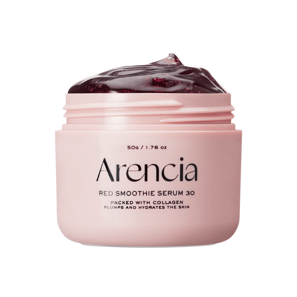 Nærbilde av Arencia Red Smoothie Serum 30 i rosa krukke, fylt med dyp rød gel for fuktighet og spenst.