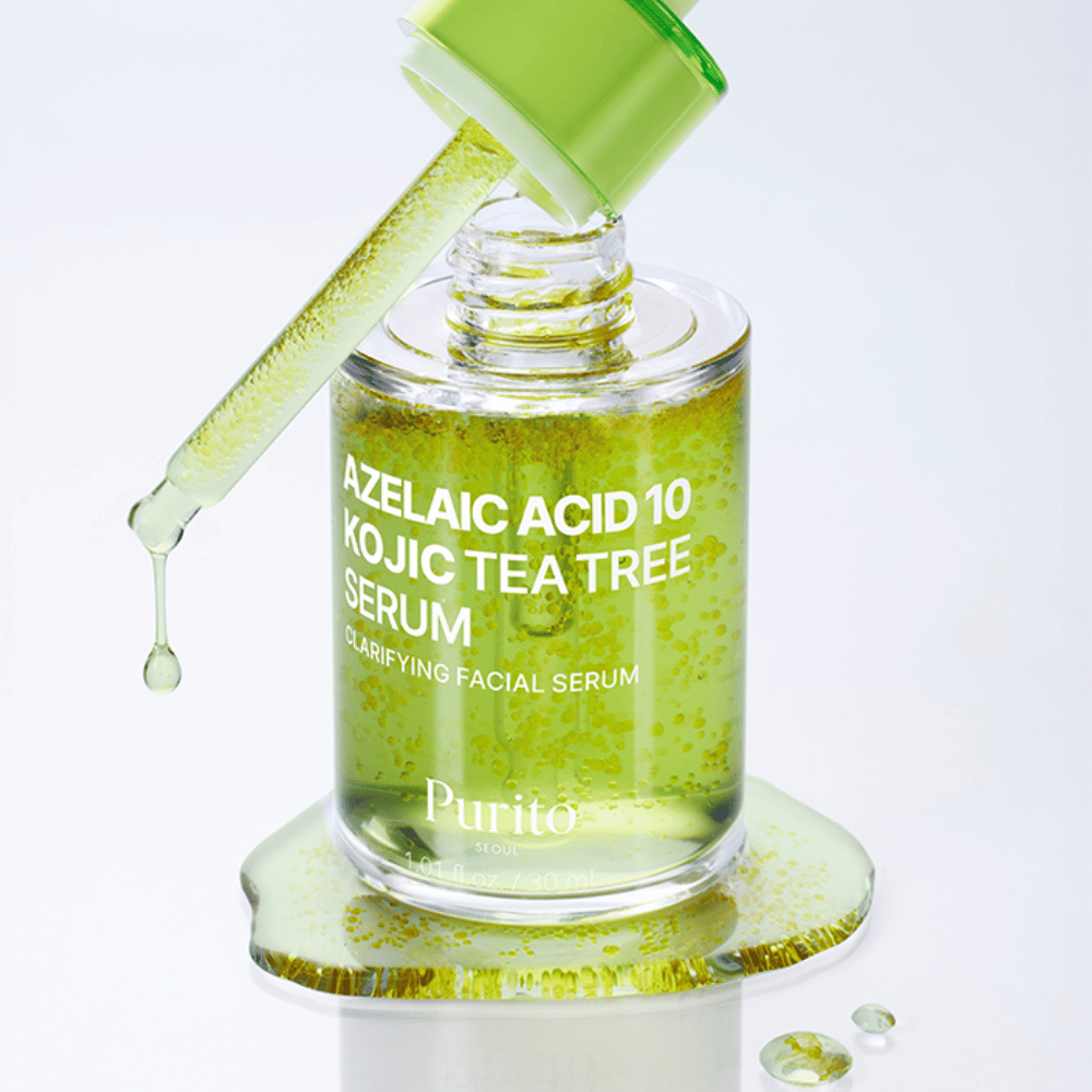 Nærbilde av Purito Azelaic Acid 10 Kojic Tea Tree Serum med pipette og dråper. Gir klarere hud og reduserer urenheter.