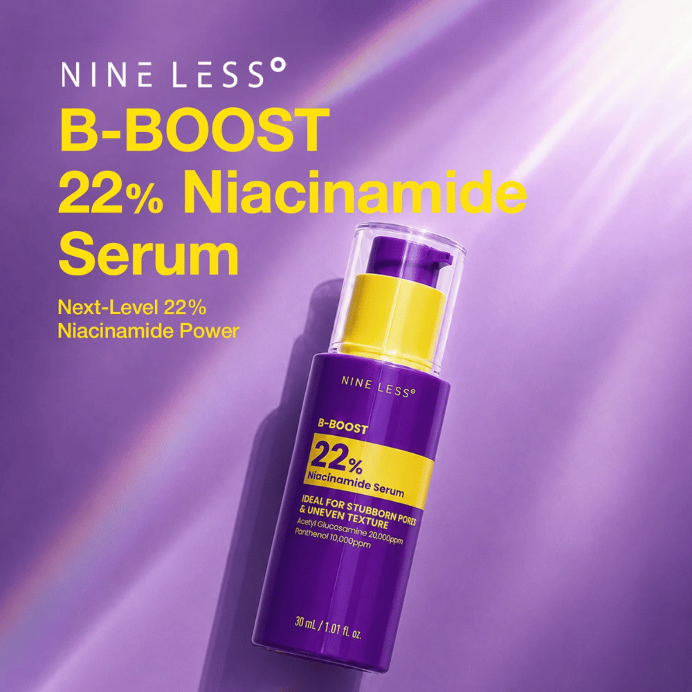 6. NINE LESS B-Boost 22% Niacinamide Serum – lilla serumflaske med gul etikett mot synlige porer