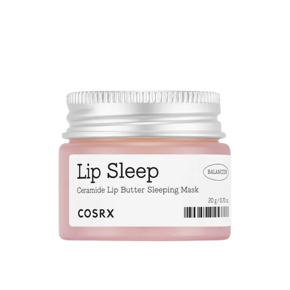 COSRX Lip Sleep Ceramide Lip Butter Sleeping Mask i rosa boks med sølvfarget lokk. En duftfri, nærende nattmaske for myke, fuktede lepper.