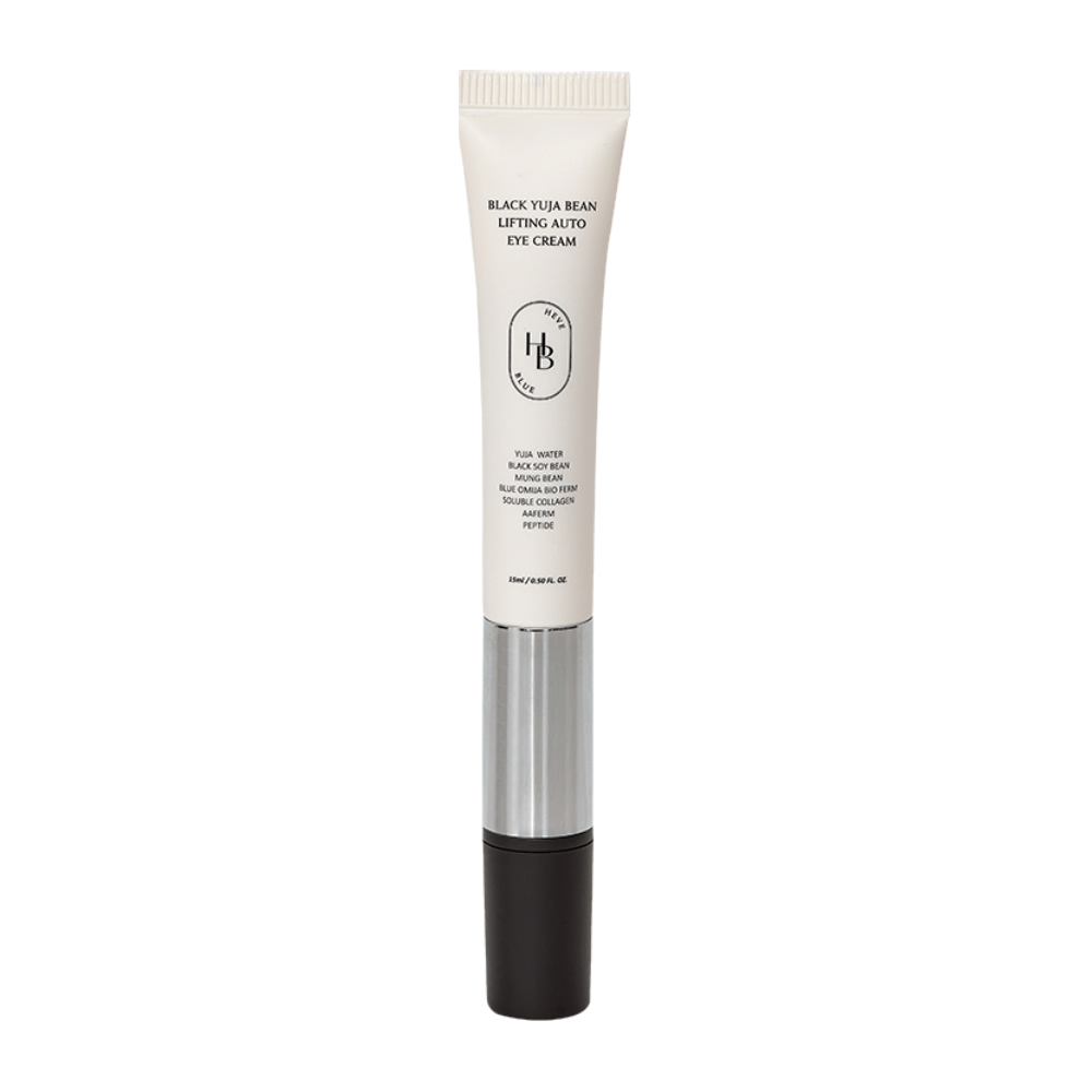 Produktbilde av HEVE BLUE Black Yuja Bean Lifting Auto Eye Cream – en tube med hvit topp, sølvmidt og svart applikator. Tekst på emballasjen lister ingredienser som yuja-vann og svart soyabønne.