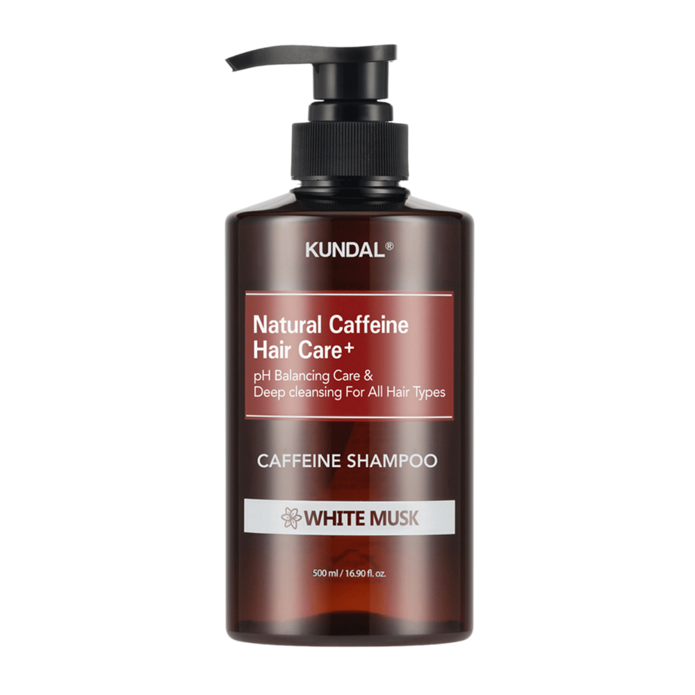 KUNDAL Natural Caffeine Hair Care+ Shampoo White Musk i brun plastflaske med pumpe, 500 ml.