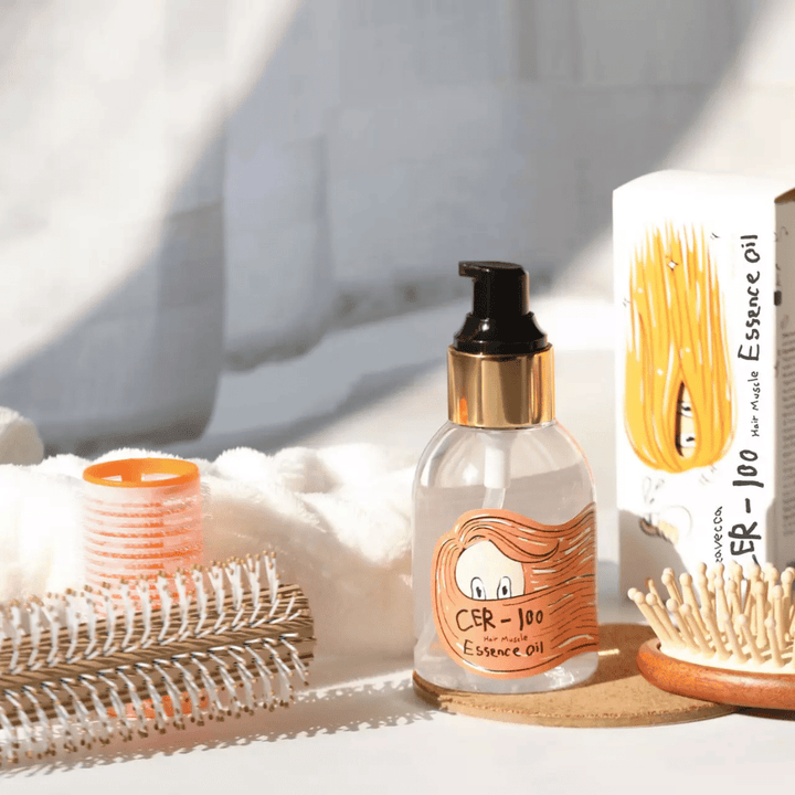 Elizavecca CER-100 Hair Muscle Essence Oil styling – fuktighetsgivende hårolje som hjelper til med å redusere frizz, gi glans og beskytte håret ved styling.