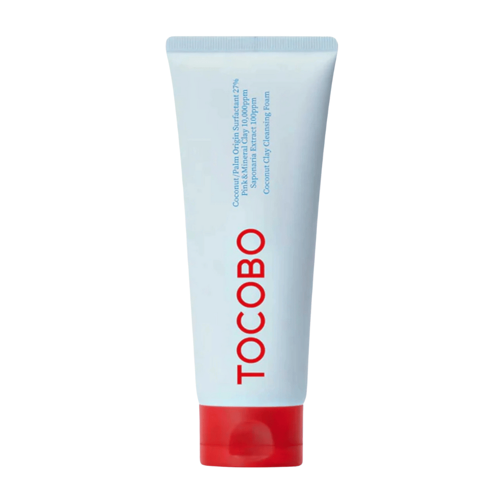 Tuben av TOCOBO Coconut Clay Cleansing Foam er synlig. Tuben er lyseblå med en rød kork og teksten "TOCOBO" i store bokstaver på forsiden. Produktet beskrives som et kokosnøttlera rengjøringsskum og inneholder naturlige ingredienser.