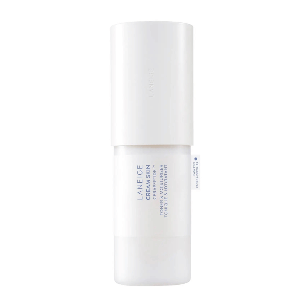Laneige Cream Skin Cerapeptide Refiner i en hvit flaske med pumpe. Produktet kombinerer toner og fuktighetskrem, designet for å fukte og tone huden.