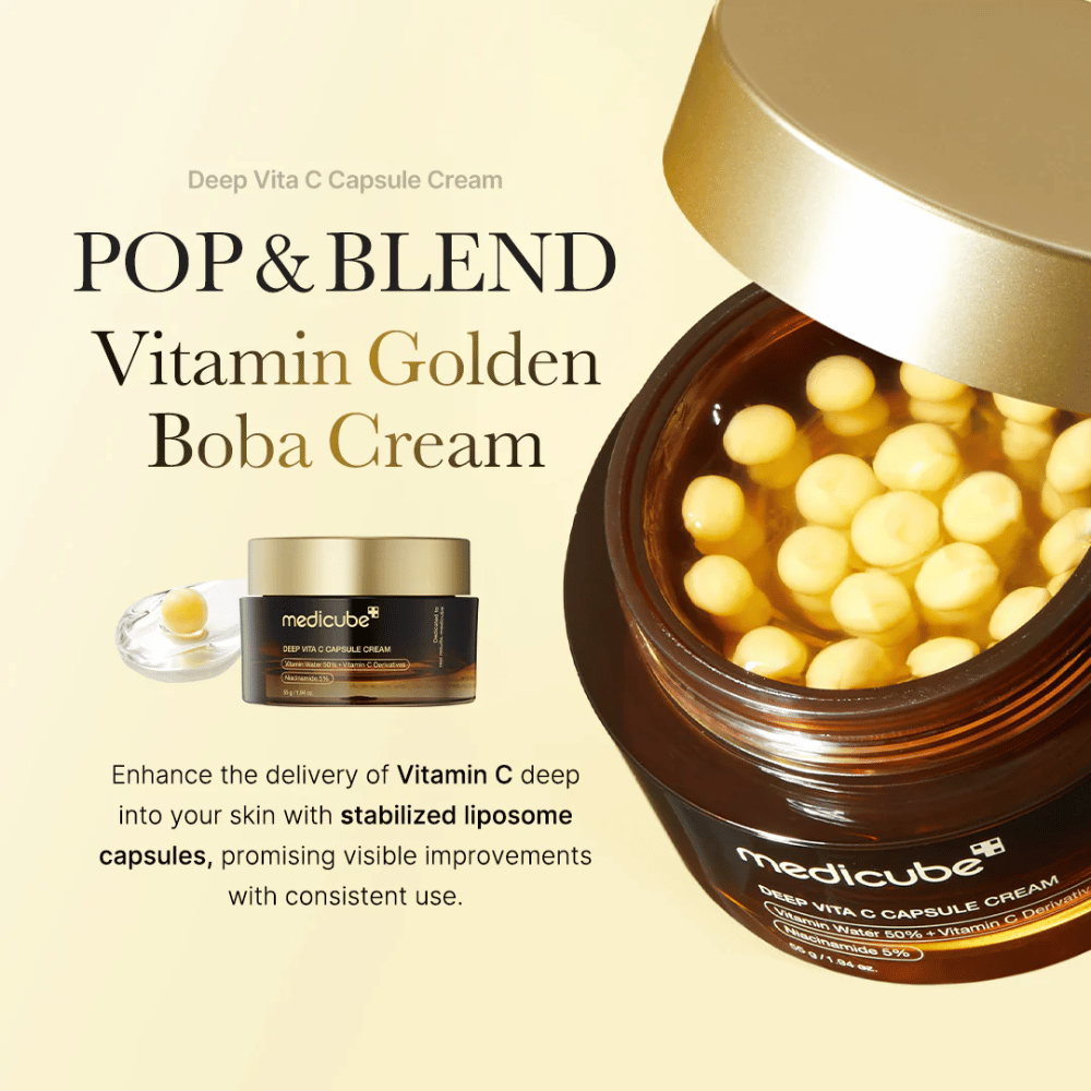 Emballasjen av "Medicube Deep Vita C Capsule Cream," en vitamin C-beriket krem som inneholder stabiliserte liposomkapsler for å effektivt trenge inn i huden. Teksten "POP & BLEND Vitamin Golden Boba Cream" fremhever produktets egenskaper, og den visuelle presentasjonen viser kapslene som lover synlige forbedringer med kontinuerlig bruk.
