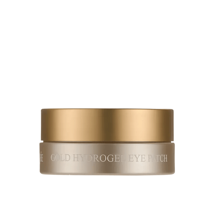 Frilagt produktbilde av PETITFEE Gold Hydrogel Eye Patch i en elegant gullfarget krukke mot lys bakgrunn. Designet gir et eksklusivt og luksuriøst inntrykk.