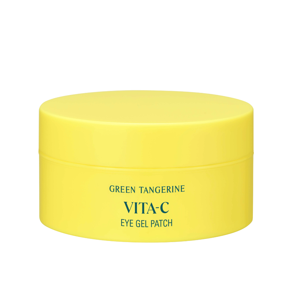 En gul boks merket "GREEN TANGERINE VITA-C EYE GEL PATCH" sannsynligvis øyemasker som inneholder vitamin C.