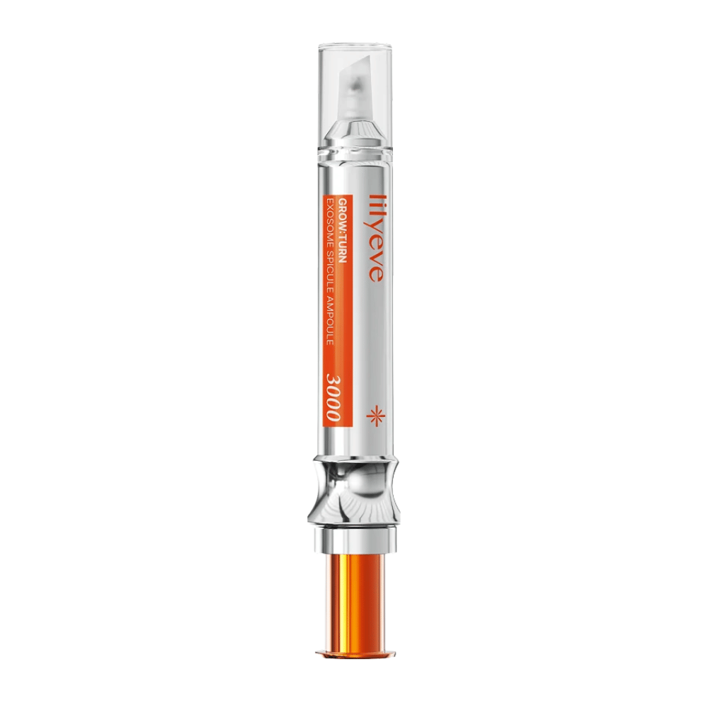 LILYEVE Grow Turn Exosome Spicule Ampoule 3000 – hodebunnampulle med presisjonsapplikator i sølv- og oransjefarget emballasje.