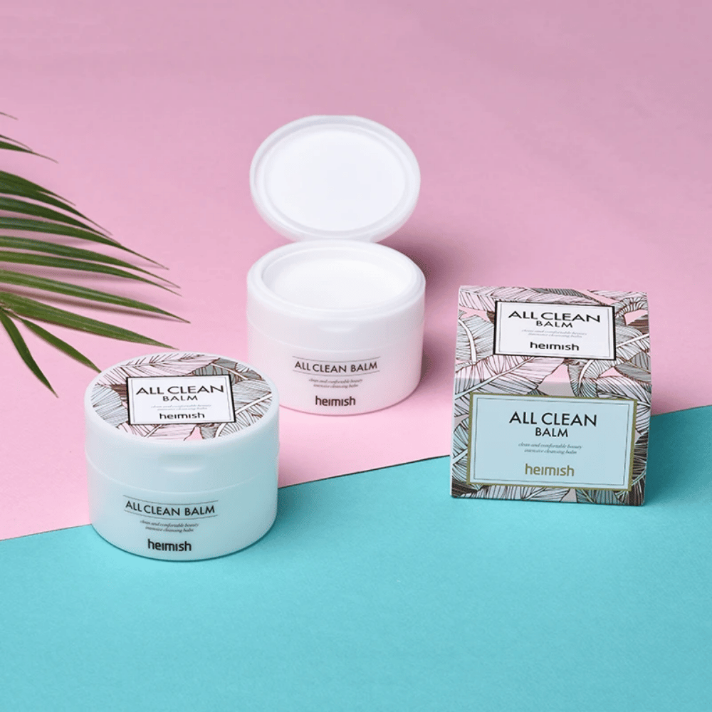 Heimish All Clean Balm 120ml og en palme på rosa og blå bakgrunn, egnet for sensitiv hud.