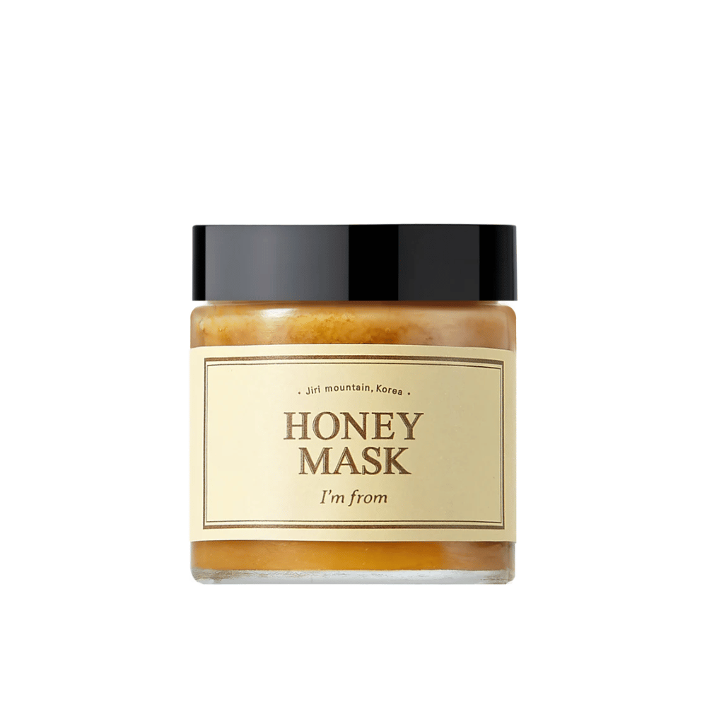  En boks "I'm from Honey Mask", med naturlig honninginnhold, mot hvit bakgrunn.