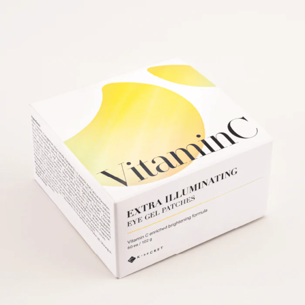 Pakke med K-Secret Extra Illuminating Eye Gel Patches med vitamin C i hvit og gul design.