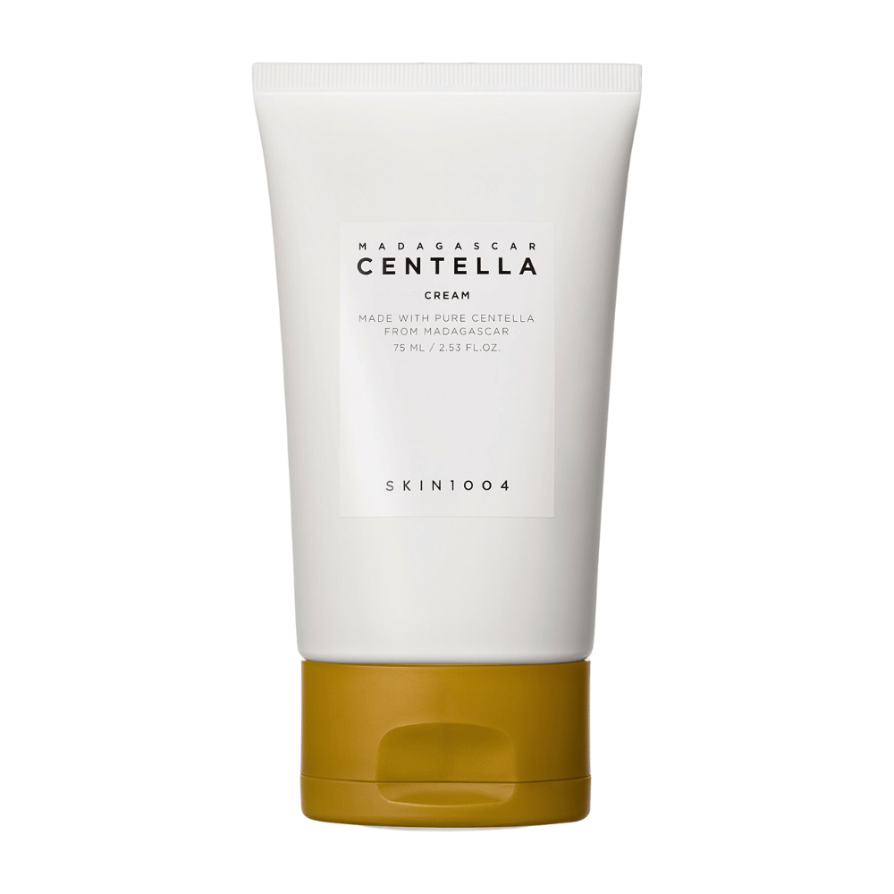 Bildet viser en tube med "Madagascar Centella Cream" fra SKIN1004. Det er en hudkrem som er laget av ren Centella fra Madagaskar og kommer i en pakning på 75 ml / 2.53 fl.oz. Produktet er ment å brukes for hudpleie, for å gi næring og fuktighet til huden.