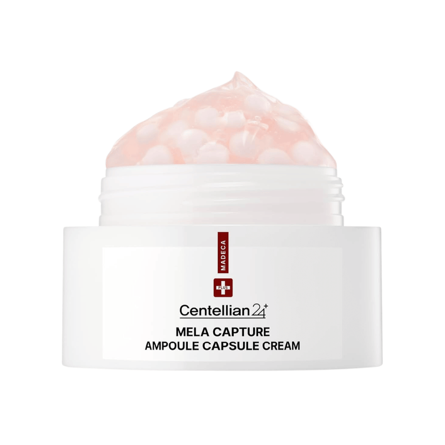 Nærbilde av Centellian24 Madeca Mela Capture Ampoule Capsule Cream som viser den rosa gelkremen med innkapslede ampullkuler i krukken.