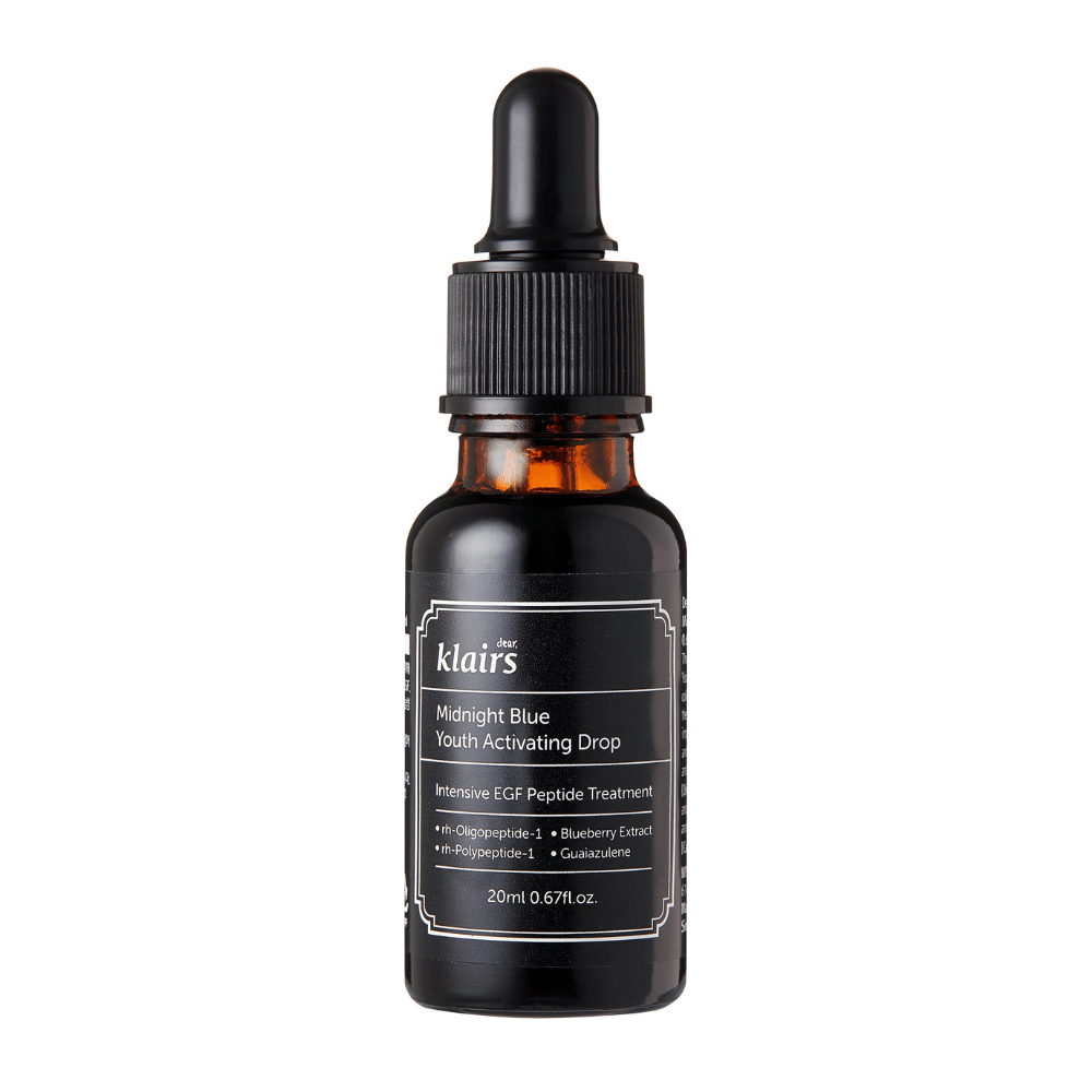 Klairs Midnight Blue Youth Activating Drop i en mørk glassflaske med pipette. Produktet inneholder EGF-peptider, blåbærekstrakt og guaiazulene for å fremme hudens elastisitet og motvirke aldringstegn.