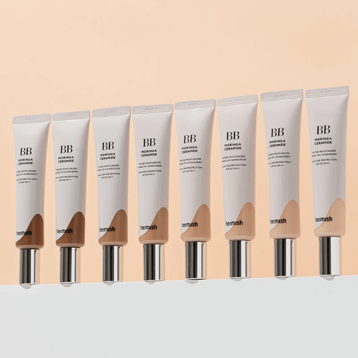 Rad med Heimish Moringa Ceramide BB Cream i flere fargenyanser. Bildet illustrerer variasjonen fra lysere til mørkere toner for å passe ulike hudtoner og behov.
