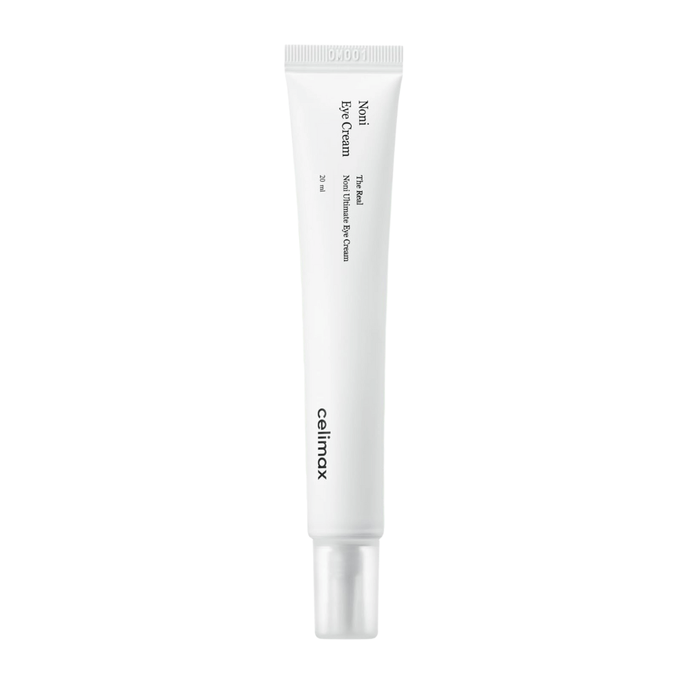 Noni Eye Cream i en hvit tube med en gjennomsiktig kork. Produktet er fra merket Celimax og inneholder 20 ml. Teksten på tuben angir at det er en nærende øyekrem.
