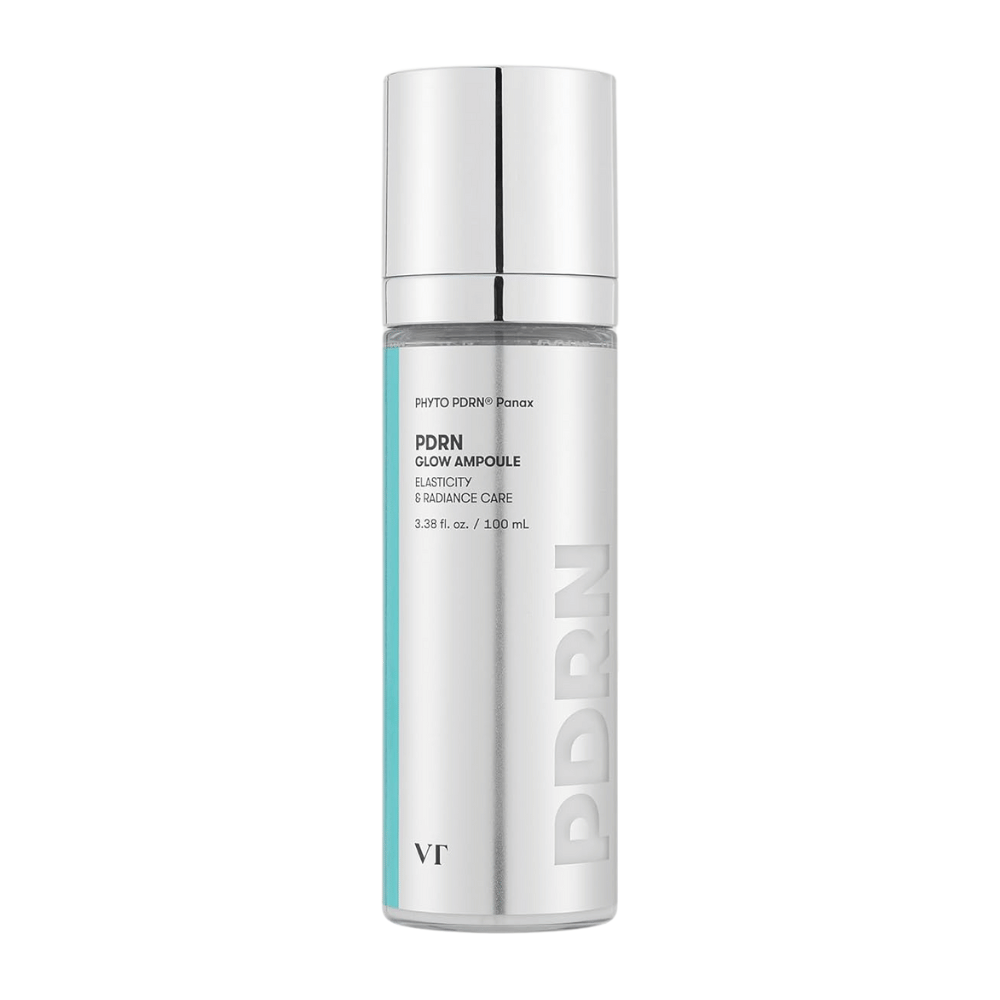VT PDRN Glow Ampoule i en sølvfarget flaske med pumpe, merking som indikerer innhold på 100 ml. Produktet er designet for elastisitet og strålende hud, med teksten "PHYTO PDRN® Panax" og "Elasticity & Radiance Care".