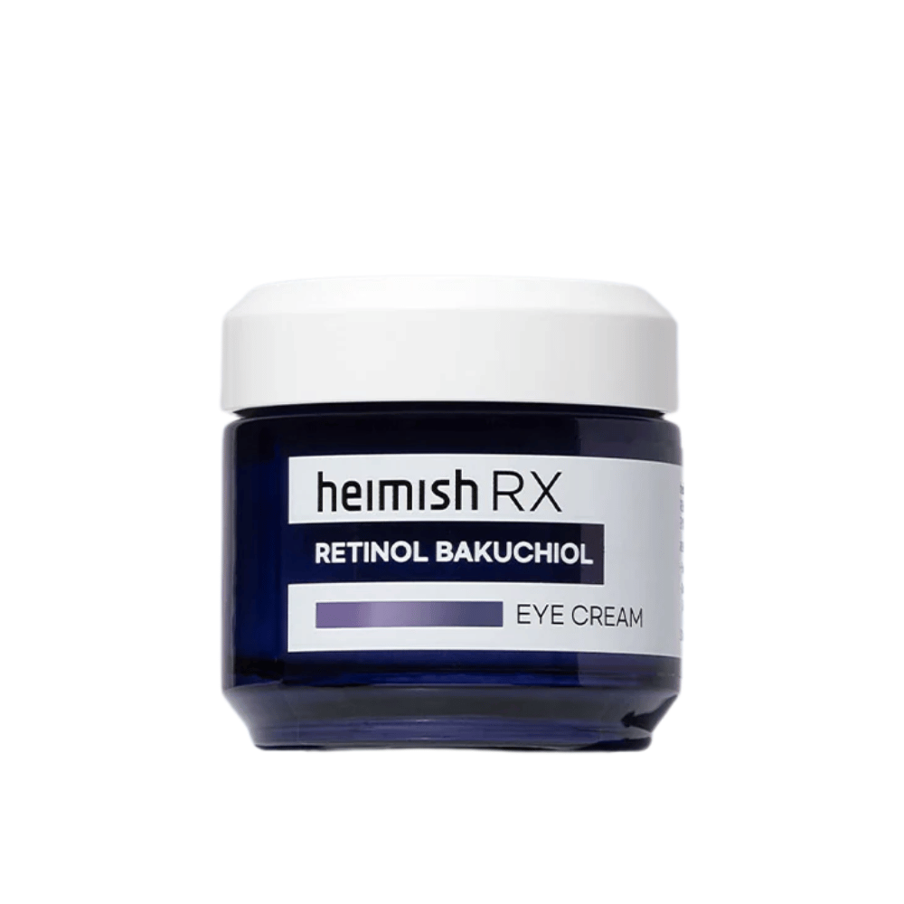 Heimish RX Retinol Bakuchiol Eye Cream i en mørkeblå boks med hvitt lokk. En øyekrem beriket med retinol og bakuchiol for en glattere og fastere hud rundt øynene.
