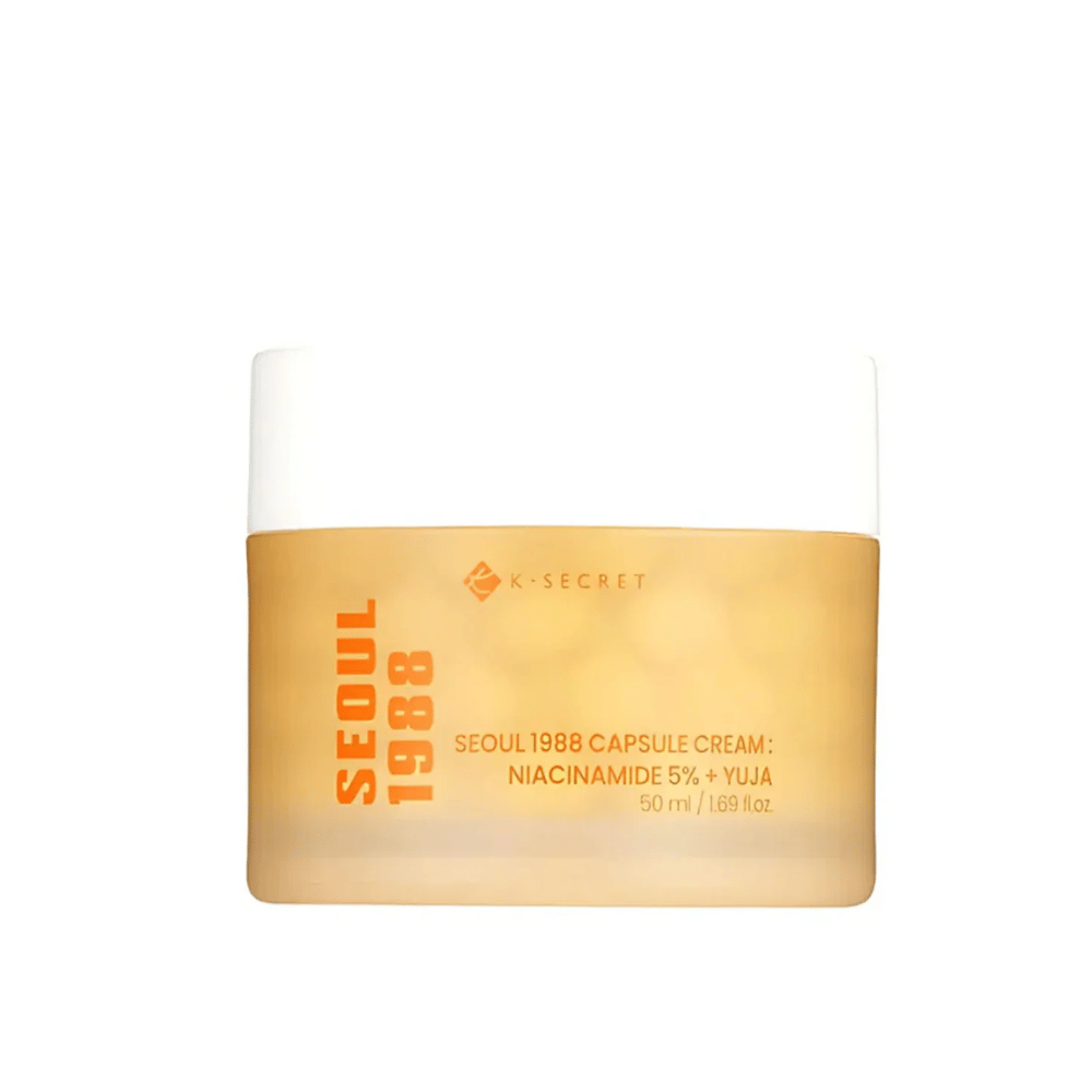 Boks med K-Secret Seoul 1988 Capsule Cream Niacinamide 5% + Yuja, 50 ml, i gullfarget designet emballasje.