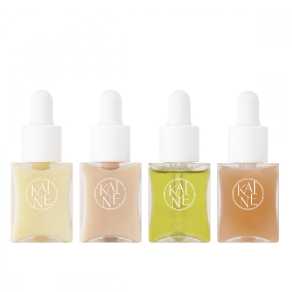 Fire fargerike serumflasker fra KAINÉ Serum Discovery Kit med pipettekork, designet for å møte ulike hudbehov i en minimalistisk og stilren emballasje.
