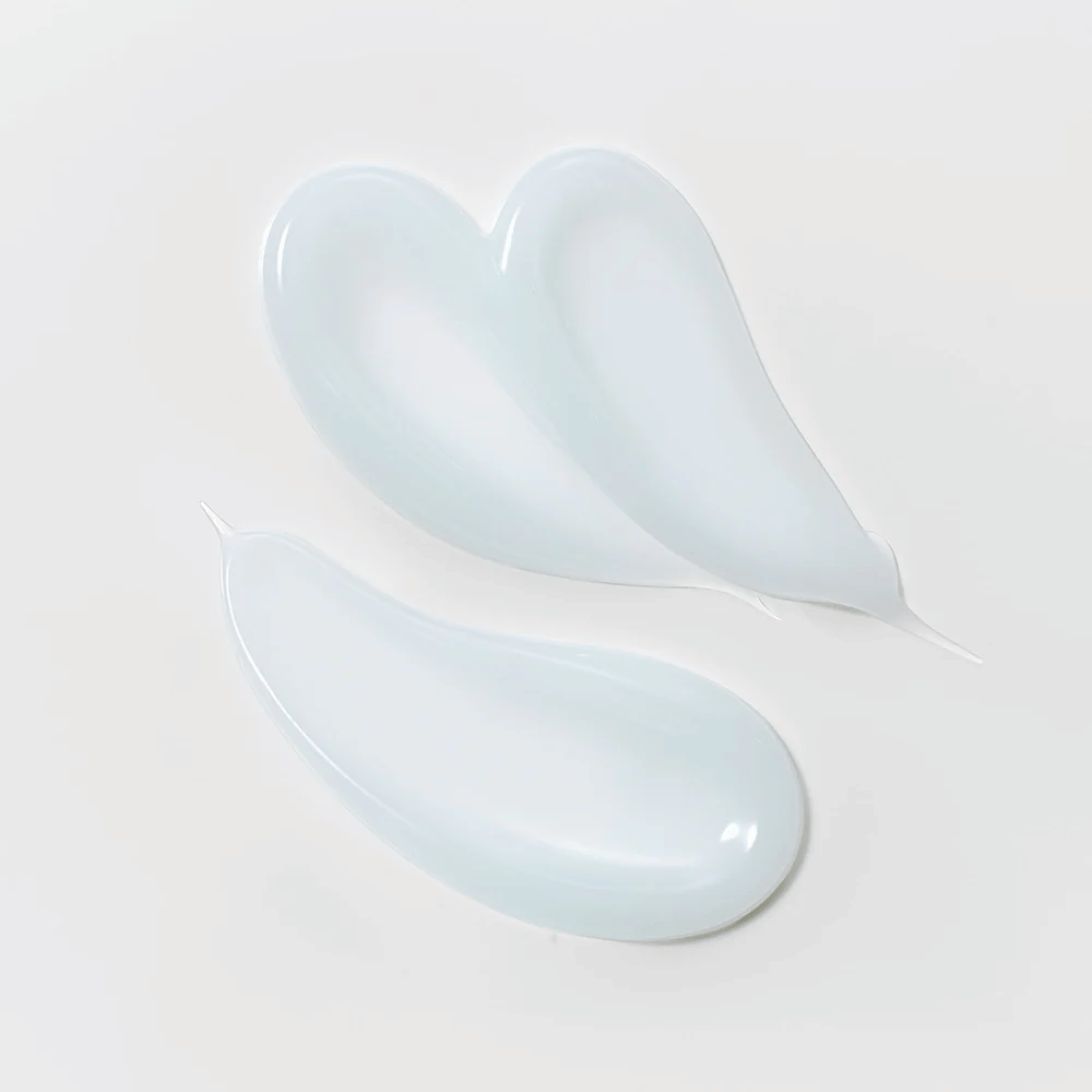 Tekstur av Slow Pure Splash Hydration Gel Cream, en lett blåaktig gel som fukter og beroliger huden.