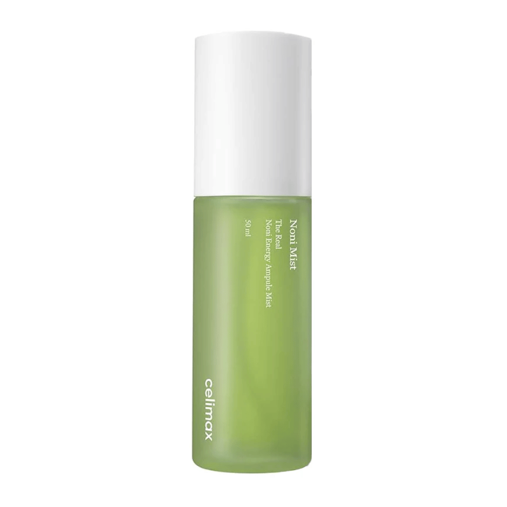 Celimax Noni Mist i en grønn flaske med hvit kork. Produktet, "The Real Noni Energy Ampule Mist," har en kapasitet på 50 ml og markedsføres for å gi energi og fuktighet til huden.