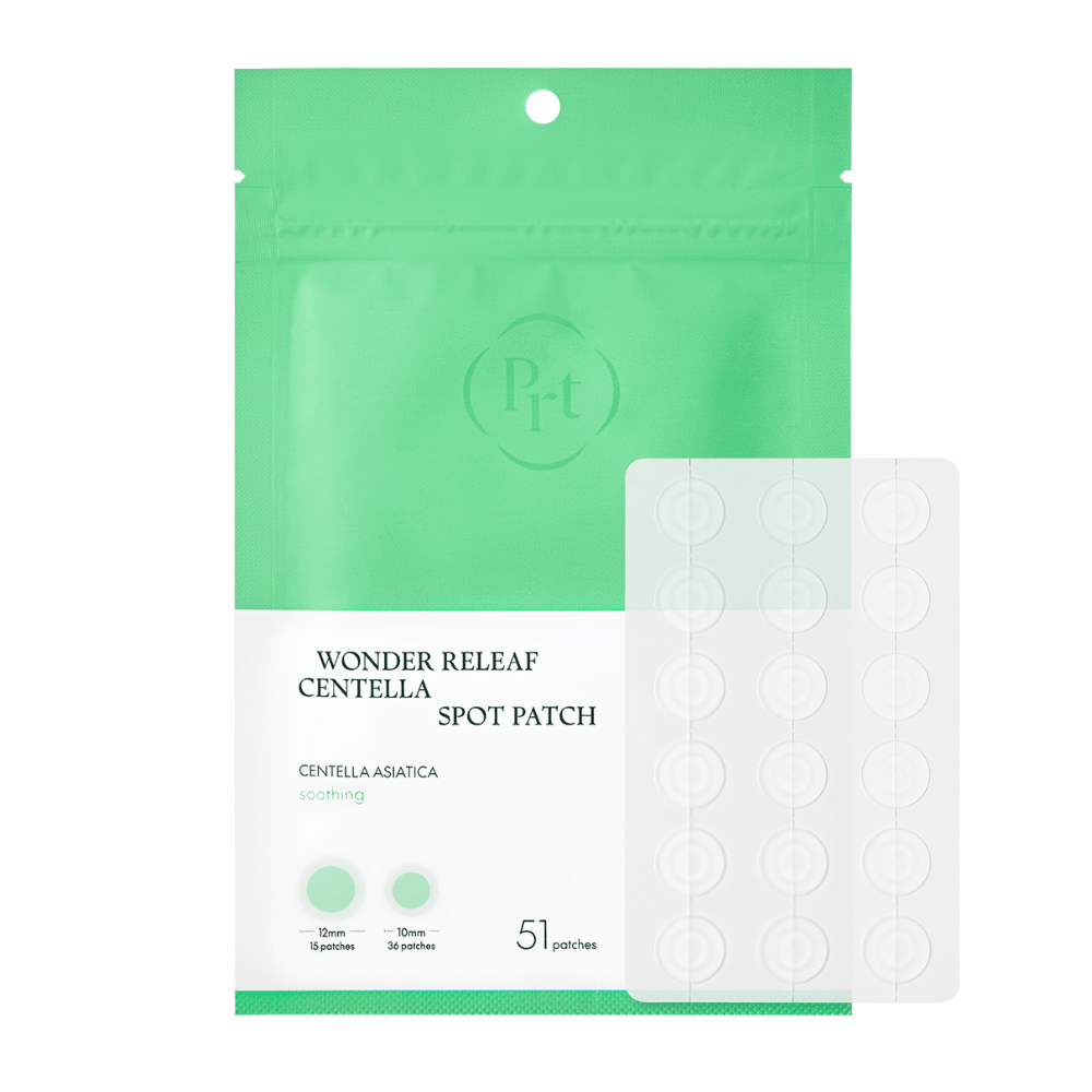 Produktbilde av Purito Wonder Releaf Centella Spot Patch med emballasje og 51 gjennomsiktige akneplaster i to størrelser for effektiv punktbehandling.