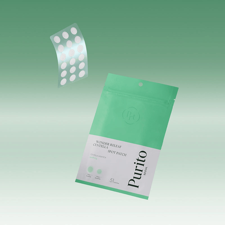 Purito Wonder Releaf Centella Spot Patch med emballasje og gjennomsiktige akneplaster, beroligende punktbehandling med centella asiatica for kviser og irritert hud.