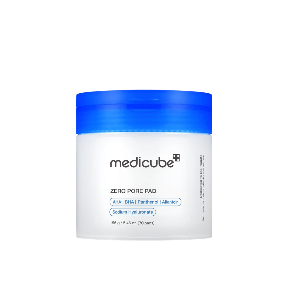 Medicube Zero Pore Pad 2.0, 70 eksfolierende toner-pads med AHA, BHA og panthenol i en hvit krukke med blått lokk mot hvit bakgrunn.