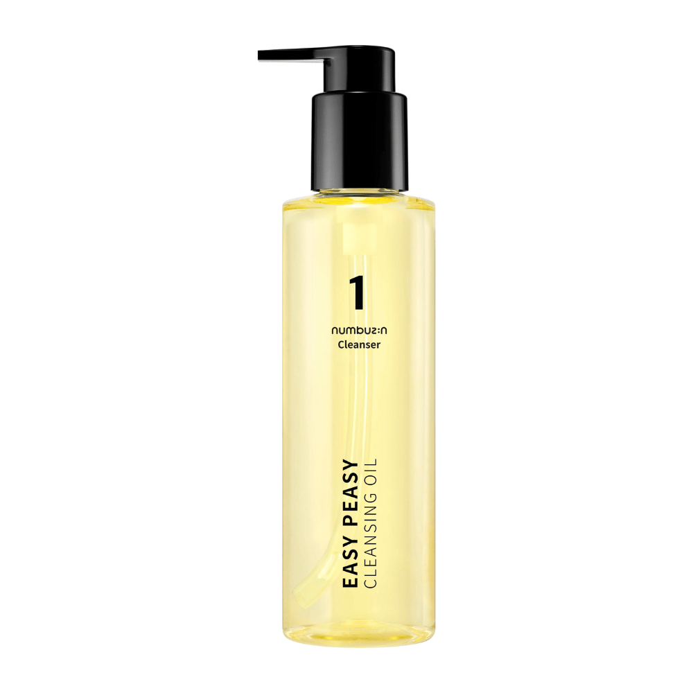 Produktbilde på Numbuzin No.1 Easy Peasy Cleansing Oil, gjennomsiktig pumpeflaske med svart lokk mot hvit bakgrunn.